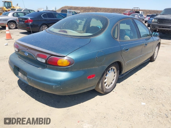 1996 Ford Taurus GL with VIN 1FALP52U3TG139417, listed as a IAAI auction lot 42760633 with 239,490 mi miles and . Bid and sale history available at DreamBid. Image 4.