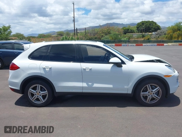 2014 Porsche Cayenne with VIN WP1AA2A22ELA97168, listed as a IAAI auction lot 42315149 with 99,183 mi miles and . Bid and sale history available at DreamBid. Image 14.