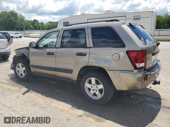 2005 Jeep Grand Cherokee Laredo with VIN 1J4HR48N65C608296, listed as a Copart auction lot 58862875 with 168,421 mi miles and Salvage title. Bid and sale history available at DreamBid. Image 2.