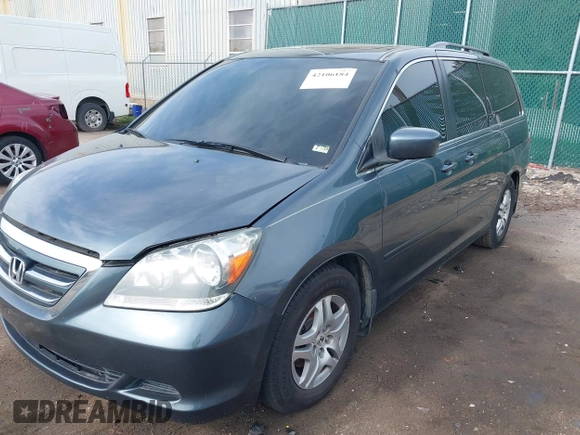 2005 Honda Odyssey EX-L with VIN 5FNRL38645B421253, listed as a IAAI auction lot 42106184 with 157,717 mi miles. Bid and sale history available at carsss.com. Image 2.