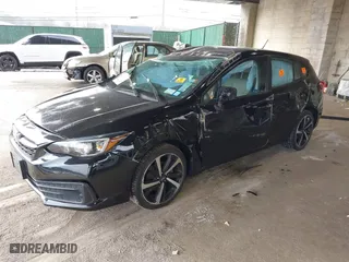 2020 Subaru Impreza with VIN 4S3GTAA64L1716459, listed as a IAAI auction lot 41673940 with 29,929 mi miles. Bid and sale history available at carsss.com. Image 2.