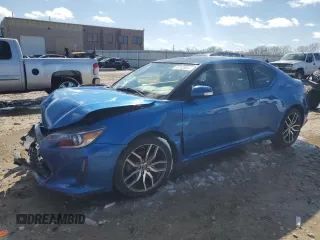 2014 Scion tC z VIN JTKJF5C77E3088097, wystawiony jako Copart lot #47128655 z przebiegiem Nie podano mil oraz Szkoda całkowita • Salvage title. Historia ofert i sprzedaży dostępna na DreamBid. Obrazek 1.