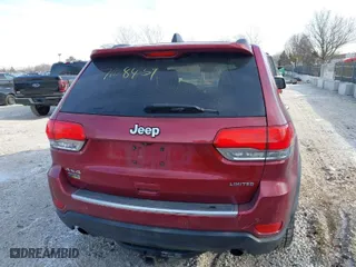 2014 Jeep Grand Cherokee Limited with VIN 1C4RJFBG7EC218735, listed as a IAAI auction lot 41265513 with 174,957 mi miles. Bid and sale history available at carsss.com. Image 16.