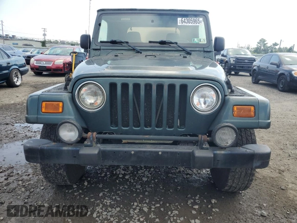2003 Jeep Wrangler Sahara with VIN 1J4FA59S73P308250, listed as a Copart auction lot 64305965 with 186,288 mi miles and Clean title. Bid and sale history available at DreamBid. Image 5.