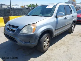 2003 Honda CR-V EX with VIN JHLRD78803C037828, listed as a IAAI auction lot 42042093 with 212,155 mi miles. Bid and sale history available at carsss.com. Image 2.