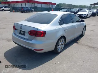 2014 Volkswagen Jetta GLI Autobahn with VIN 3VW5T7AJXEM310901, listed as a IAAI auction lot 42622301 with 139,821 mi miles and . Bid and sale history available at DreamBid. Image 4.