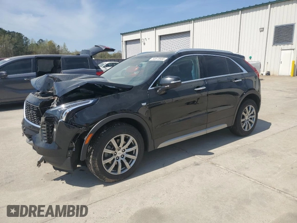 2021 Cadillac XT4 FWD Premium Luxury z VIN 1GYFZCR48MF002468, wystawiony jako Copart lot #50878955 z przebiegiem 76 034 mil mil oraz Szkoda całkowita • Salvage title. Historia ofert i sprzedaży dostępna na DreamBid. Obrazek 1.
