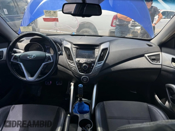 2013 Hyundai Veloster w/Black Int z VIN KMHTC6AD1DU094781, wystawiony jako Copart lot #60271115 z przebiegiem 122 541 mil mil oraz Szkoda całkowita • Salvage title. Historia ofert i sprzedaży dostępna na DreamBid. Obrazek 9.