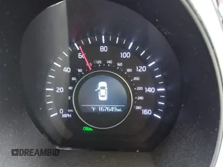 2015 Kia Optima LX with VIN 5XXGM4A75FG485653, listed as a IAAI auction lot 41082053 with 167,649 mi miles. Bid and sale history available at carsss.com. Image 7.