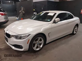 2015 BMW 4 Series 428i xDrive with VIN WBA3T1C52FP821020, listed as a IAAI auction lot 42004707 with 74,951 mi miles and . Bid and sale history available at carsss.com. Image 2.