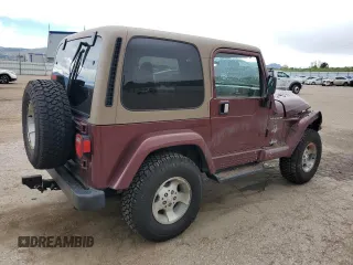 2002 Jeep Wrangler Sahara with VIN 1J4FA59S32P746410, listed as a Copart auction lot 56403075 with 147,968 mi miles and Salvage title. Bid and sale history available at DreamBid. Image 3.