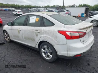 2013 Ford Focus SE z VIN 1FADP3F20DL302583, wystawiony jako IAAI lot #42332079 z przebiegiem 149 535 mil mil oraz . Historia ofert i sprzedaży dostępna na DreamBid. Obrazek 3.