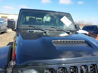 2021 Jeep Gladiator Mojave with VIN 1C6JJTEG9ML528964, listed as a IAAI auction lot 41879113 with 74,315 mi miles and . Bid and sale history available at DreamBid. Image 6.