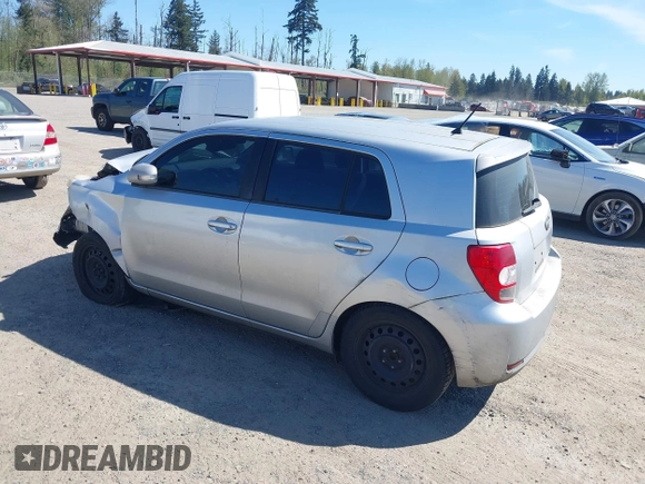 2008 Scion xD with VIN JTKKU10418J024201, listed as a IAAI auction lot 42074208 with 163,458 mi miles. Bid and sale history available at carsss.com. Image 3.