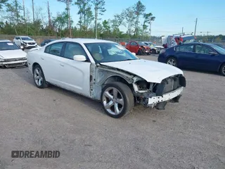 2011 Dodge Charger SE with VIN 2B3CL3CG3BH506825, listed as a IAAI auction lot 41882433 with 209,712 mi miles and . Bid and sale history available at carsss.com. Image 1.