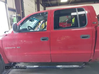 2000 Dodge Dakota Sport z VIN 1B7GG2AN5YS793828, wystawiony jako IAAI lot #41955863 z przebiegiem 267 861 mil mil oraz . Historia ofert i sprzedaży dostępna na DreamBid. Obrazek 14.