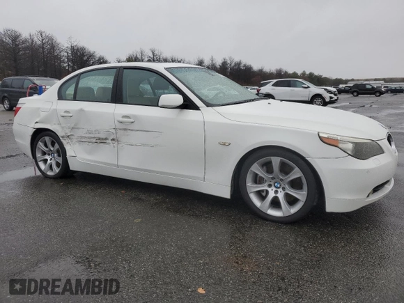 2006 BMW 5 Series 550i with VIN WBANB535X6CP01394, listed as a Copart auction lot 81225264 with 124,599 mi miles and Salvage Title. Bid and sale history available at DreamBid. Image 4.