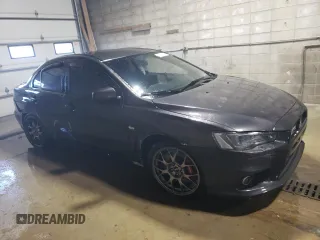 2014 Mitsubishi Lancer Evolution MR with VIN JA32W5FV4EU025232, listed as a Copart auction lot 89271835 with 85,902 mi miles and Salvage Title. Bid and sale history available at carsss.com. Image 4.