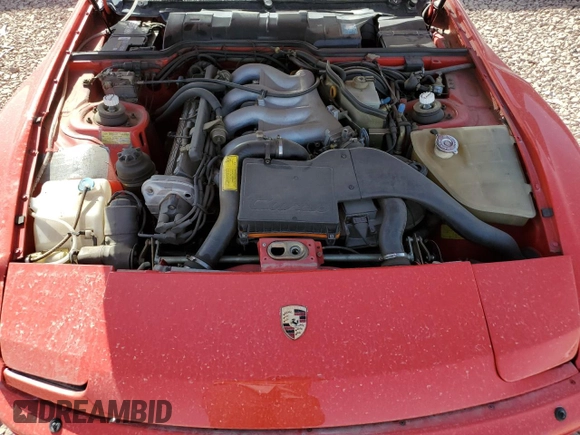 1986 Porsche 944 z VIN WP0AA0954GN154787, wystawiony jako Copart lot #47305065 z przebiegiem 73 671 mil mil oraz Szkoda całkowita • Salvage title. Historia ofert i sprzedaży dostępna na DreamBid. Obrazek 12.