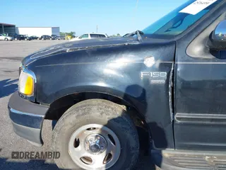 2001 Ford F-150 XLT z VIN 1FTRW07L61KC53030, wystawiony jako IAAI lot #42526499 z przebiegiem 121 675 mil mil oraz . Historia ofert i sprzedaży dostępna na DreamBid. Obrazek 6.