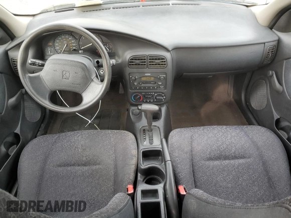 2001 Saturn SL z VIN 1G8ZH52831Z348124, wystawiony jako Copart lot #76058854 z przebiegiem 191 465 mil mil oraz Szkoda całkowita • Salvage title. Historia ofert i sprzedaży dostępna na DreamBid. Obrazek 8.