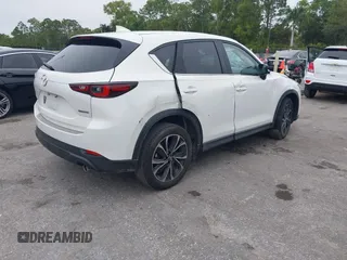 2023 Mazda CX-5 2.5 S Premium Package with VIN JM3KFBDM1P0126787, listed as a IAAI auction lot 41164586 with 12,076 mi miles. Bid and sale history available at carsss.com. Image 4.