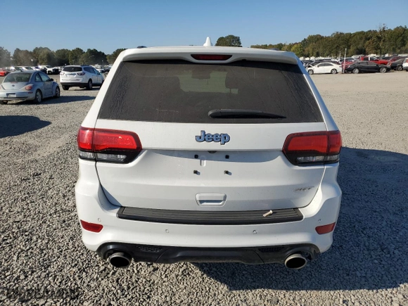 2015 Jeep Grand Cherokee SRT with VIN 1C4RJFDJ4FC625552, listed as a Copart auction lot 77171974 with 114,932 mi miles and Clean Title. Bid and sale history available at carsss.com. Image 6.