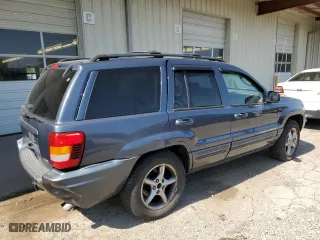 2003 Jeep Grand Cherokee Limited with VIN 1J8GW58N73C605929, listed as a Copart auction lot 70755024 with 173,147 mi miles and Salvage Title. Bid and sale history available at carsss.com. Image 3.