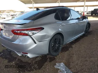 2021 Toyota Camry XSE z VIN 4T1K61AK2MU484387, wystawiony jako IAAI lot #41621573 z przebiegiem 83 338 mil mil oraz . Historia ofert i sprzedaży dostępna na DreamBid. Obrazek 4.
