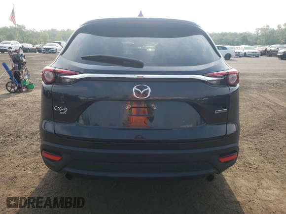 2022 Mazda CX-9 Sport с VIN JM3TCBBY2N0607874, выставлен на аукционе Copart как лот 59440115 с пробегом 35 771 миль миль и Списание • Salvage title. История ставок и продаж доступна на DreamBid. Изображение 6.