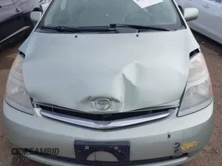 2006 Toyota Prius z VIN JTDKB20U963131145, wystawiony jako IAAI lot #41857847 z przebiegiem 113 251 mil mil oraz . Historia ofert i sprzedaży dostępna na DreamBid. Obrazek 6.