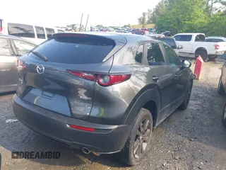 2024 Mazda CX-30 S Select Sport z VIN 3MVDMBBM1RM634542, wystawiony jako IAAI lot #42204673 z przebiegiem 24 694 mil mil oraz . Historia ofert i sprzedaży dostępna na DreamBid. Obrazek 4.