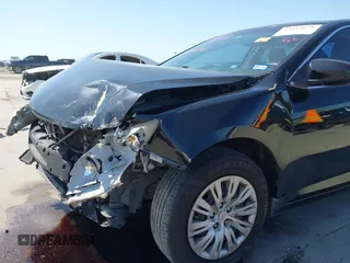 2013 Toyota Camry L with VIN 4T4BF1FK1DR308848, listed as a IAAI auction lot 42014028 with 192,645 mi miles. Bid and sale history available at carsss.com. Image 20.