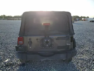 2018 Jeep Wrangler Willys Wheeler W z VIN 1C4AJWAGXJL852498, wystawiony jako Copart lot #52866945 z przebiegiem 90 515 mil mil oraz Szkoda całkowita • Salvage title. Historia ofert i sprzedaży dostępna na DreamBid. Obrazek 6.