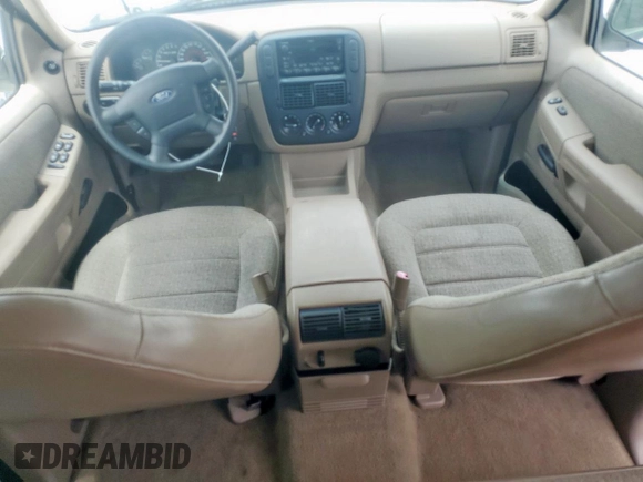 2002 Ford Explorer XLS with VIN 1FMZU62E62UA69368, listed as a Copart auction lot 61571065 with 124,095 mi miles and Salvage title. Bid and sale history available at DreamBid. Image 8.