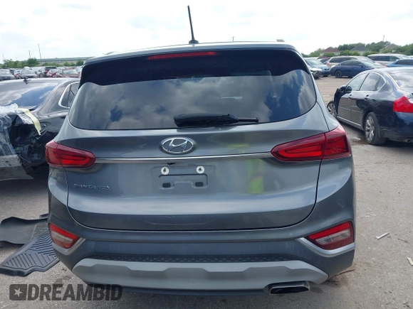 2020 Hyundai Santa Fe SE z VIN 5NMS23AD3LH155930, wystawiony jako IAAI lot #42155889 z przebiegiem 64 441 mil mil oraz . Historia ofert i sprzedaży dostępna na DreamBid. Obrazek 17.
