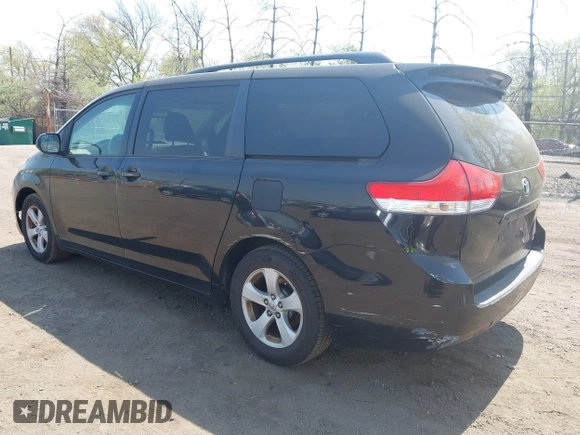 2011 Toyota Sienna LE AAS with VIN 5TDKK3DC4BS173688, listed as a IAAI auction lot 42106211 with 282,301 mi miles. Bid and sale history available at carsss.com. Image 3.
