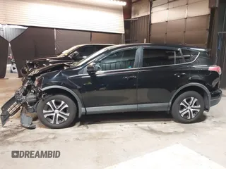 2018 Toyota RAV4 LE with VIN 2T3BFREV7JW768376, listed as a IAAI auction lot 41864571 with 292,147 mi miles. Bid and sale history available at carsss.com. Image 15.