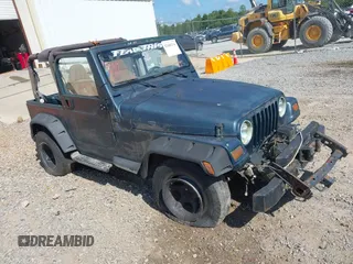 1998 Jeep Wrangler Sport with VIN 1J4FY19S2WP710055, listed as a IAAI auction lot 42680216 with Not provided miles and . Bid and sale history available at DreamBid. Image 1.