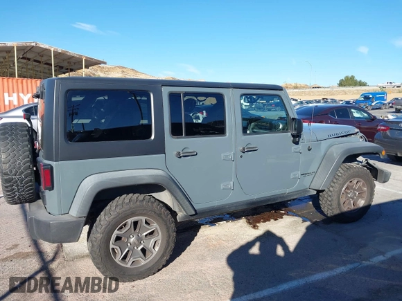 2014 Jeep Wrangler Unlimited Rubicon X with VIN 1C4BJWFG3EL134522, listed as a IAAI auction lot 41221381 with 66,897 mi miles and . Bid and sale history available at DreamBid. Image 13.