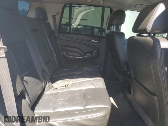 2019 Chevrolet Tahoe LT with VIN 1GNSKBKC5KR137818, listed as a Copart auction lot 50654885 with 138,334 mi miles and Salvage title. Bid and sale history available at DreamBid. Image 12.