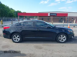 2014 Kia Optima LX z VIN 5XXGM4A76EG301383, wystawiony jako IAAI lot #42180600 z przebiegiem 97 132 mil mil oraz . Historia ofert i sprzedaży dostępna na DreamBid. Obrazek 14.