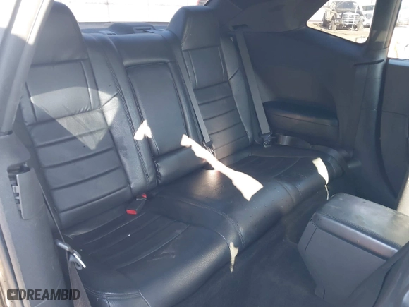 2013 Dodge Challenger SXT with VIN 2C3CDYAG5DH562557, listed as a IAAI auction lot 41694697 with 135,915 mi miles. Bid and sale history available at carsss.com. Image 8.