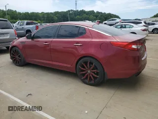 2013 Kia Optima SX with VIN 5XXGR4A63DG208778, listed as a Copart auction lot 57439155 with 169,726 mi miles and Salvage title. Bid and sale history available at DreamBid. Image 2.