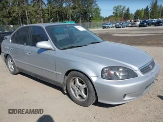 1999 Honda Civic EX z VIN 2HGEJ8540XH502009, wystawiony jako IAAI lot #42094985 z przebiegiem 294 805 mil mil oraz . Historia ofert i sprzedaży dostępna na DreamBid. Obrazek 1.