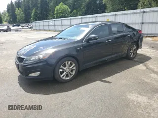 2013 Kia Optima LX z VIN 5XXGM4A79DG144608, wystawiony jako Copart lot #57461585 z przebiegiem 120 677 mil mil oraz Szkody całkowita. Historia ofert i sprzedaży dostępna na DreamBid. Obrazek 1.