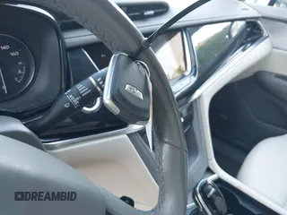 2022 Cadillac XT6 Premium Luxury z VIN 1GYKPDRS3NZ124924, wystawiony jako IAAI lot #42215418 z przebiegiem 32 368 mil mil oraz . Historia ofert i sprzedaży dostępna na DreamBid. Obrazek 11.