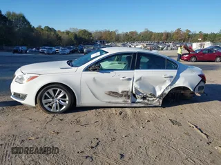 2016 Buick Regal Premium I z VIN 2G4GR5EX8G9162042, wystawiony jako IAAI lot #40840420 z przebiegiem 125 709 mil mil oraz . Historia ofert i sprzedaży dostępna na DreamBid. Obrazek 15.