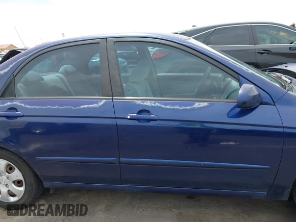 2007 Kia Spectra EX z VIN KNAFE122775468060, wystawiony jako IAAI lot #42225413 z przebiegiem 124 306 mil mil oraz . Historia ofert i sprzedaży dostępna na DreamBid. Obrazek 13.