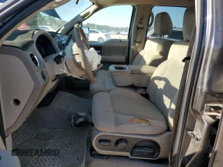 2005 Ford F-150 XLT with VIN 1FTRW12W65KD95732, listed as a Copart auction lot 48598155 with 195,368 mi miles and Salvage Title. Bid and sale history available at DreamBid. Image 7.